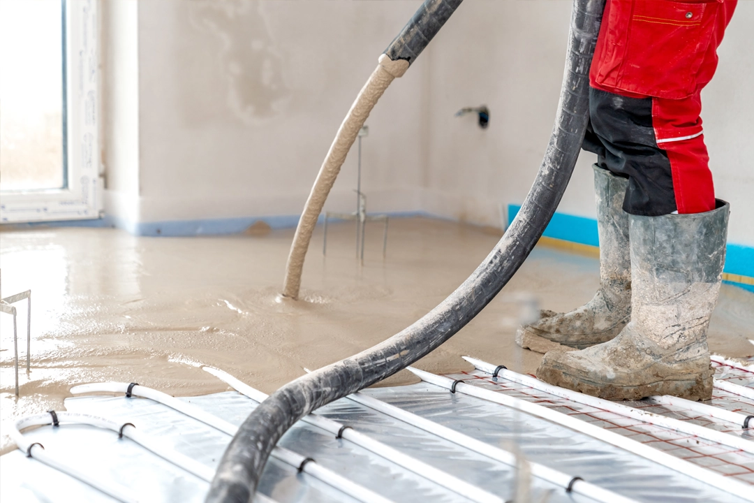 Torc Contracts application of concrete on the floor on underfloor heating